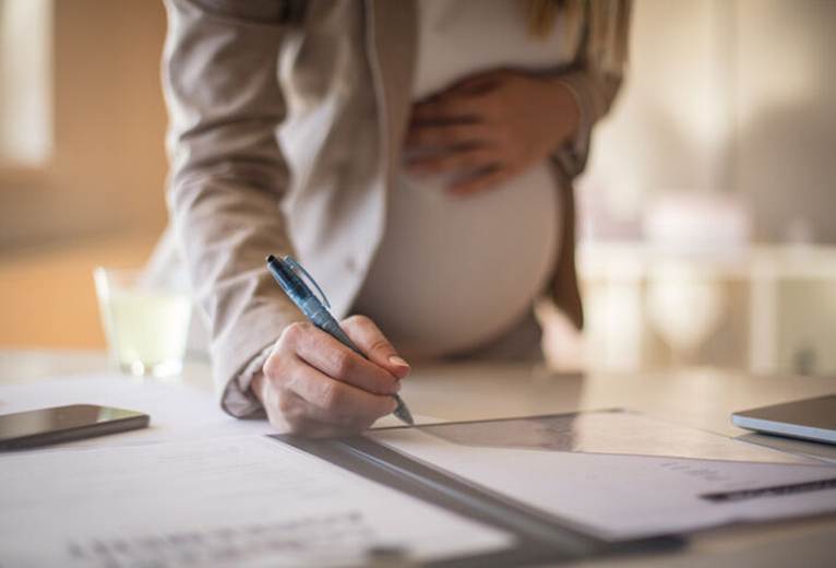 Pregnant woman going into labor at work - Pregnancy Discrimination